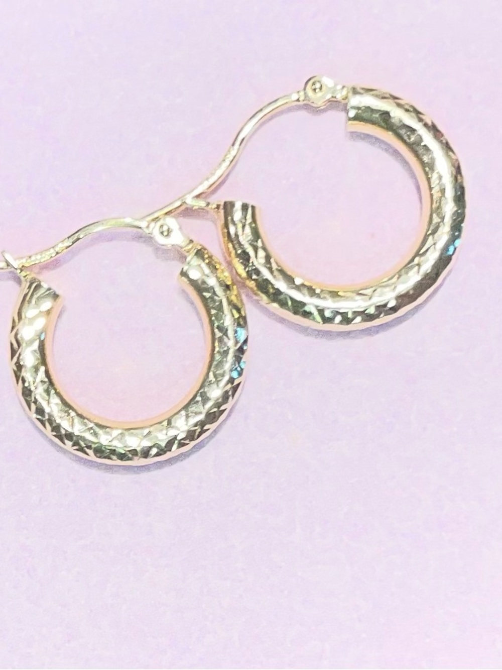 14k Solid Yellow Gold Diamond
Cut Textured Round Hoop Earrings
Marked - Picture 12 of 14